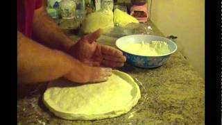 How to hand stretch Pizza Dough