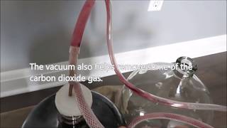 Racking wine using an upright vacuum cleaner