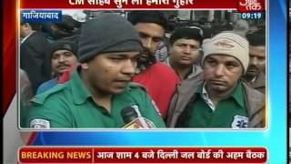 People wait outside Kejriwal's house