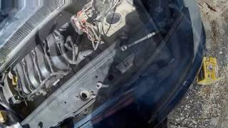 Замена лампы ближнего света в Рено Сценик 2/Replacement of a passing beam lamp in Renault Scenic 2