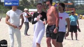 Lara stone gets wet as she poses in Miami beach photoshoot