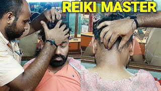 REIKI master head massage and neck cracking.