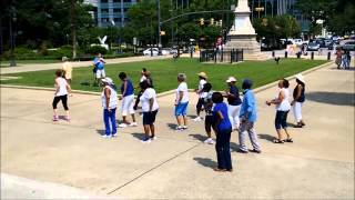 Soul Line Dancing Breaks Out Beneath Confederate Flag In Columbia, SC