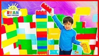 Ryan builds the tallest giant Lego tower challenge vs mommy!