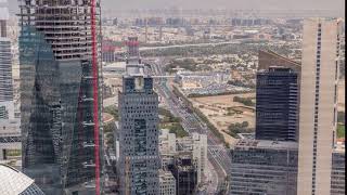 Skyline view of the buildings of Sheikh Zayed Road and DIFC aerial timelapse in Dubai, UAE.