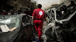 قوات الأسد تقصف قوافل الهلال الأحمر و منظمة الصحة العالمية في مدينة دوما
