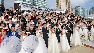 해운대에서 펼쳐진 이색 이벤트 '중국 예비부부 78쌍 단체 결혼식 '