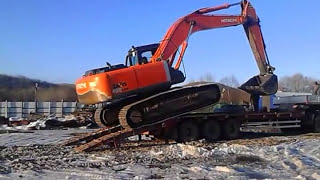 Как правильно заезжать на трал на экскаваторе (хитачи 400)