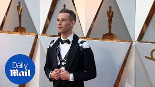 Olympic skater Adam Rippon walks down the 2018 Oscars red carpet - Daily Mail