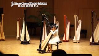 Jolin wins Champion in France at a French harp competition