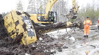 Excavator in deep trouble