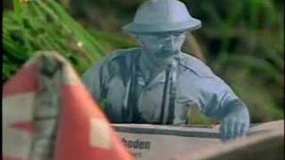 Löwenzahn - Peter Lustig als Papierfigur im Bach
