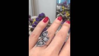 Серебряное кольцо с чернением и фианитами Три листика
