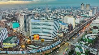 EDSA and North Avenue at dawn in 4K aerial video. EDSA and North Avenue at sunrise.