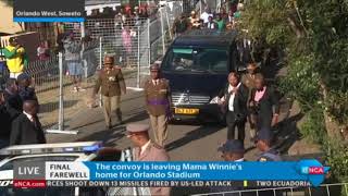 Winnie Mandela's casket being led out of her home in Soweto