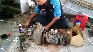 Membuka mesin air Grundfos yang berisik
