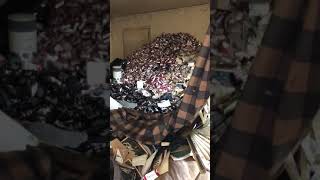 Extreme Hoarder-Beer and Cigarettes piled to the ceiling