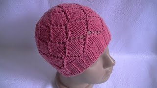 Вязание шапки ажурным узором на круговых спицах.Knitting hats openwork pattern on circular needles.