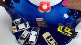 Игрушечные машинки в лизуне