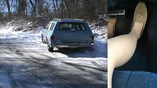 Tara's Oldsmobile Stuck and Spinning Tires Hard In The Snow