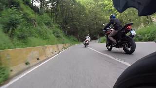 R1200GS Rallye chasing KTM SA 1290s and R1200GS at passo di Muraglione