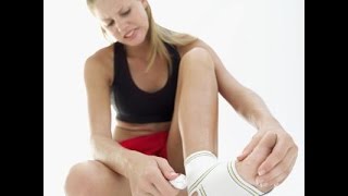 Skate girl rolls her ankle.