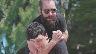 Beating up a 14-year-old.