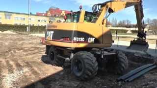 CAT Loader and CAT excavator in collaboration outside Visby 2013