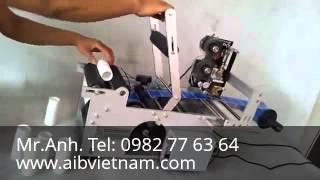 Máy dán nhãn chai tròn bán tự động - May dan nhan chai tron ban tu dong
