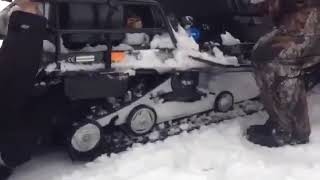 Затянуло в снегоход