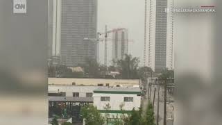 Construction cranes spin from Irma winds