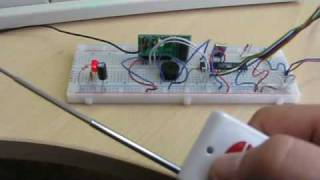 Приемник и передатчик, микроконтроллер  ATMega8, buzzer.