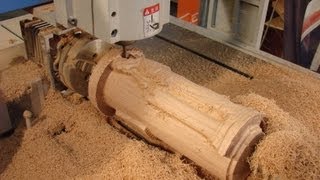 6090 CNC router machining a 4th axis angel in oak