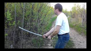 Удар катаной снизу вверх. Рубка Katana снизу вверх ствола дерева