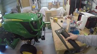 J. Deere 1025r. Get that hidden grease zerk on your drive shaft.