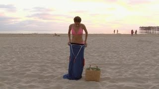 The Undress - Watch her change out of her clothes into a bikini without getting naked!
