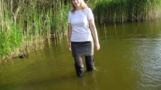 Wet leather skirt. She like swimming in leather skirt, boots, jacket. (slideshow)