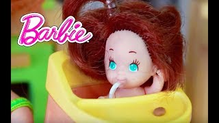 Barbie Toby plays inside at KidKraft Dollhouse