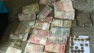 One Lakh (100,000) Indian Rupees; all denomination  notes & coins, India: 1st May 2012