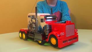 ТРАНСФОРМЕРЫ автобот ОПТИМУС ПРАЙМ на пульте управления Optimus Prime ИГРУШКИ ИЗ МУЛЬТИКА распаковка