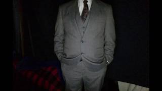 Wearing a suit and inflating my belly like a balloon