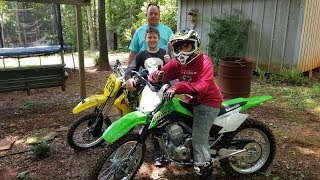 Riding Dirt bikes in the summer. Kawasaki and Suzuki