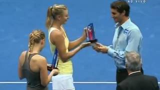 Roger Federer delivering the trophy to Maria Sharapova and Caroline Wozniacki Gillette Federer Tour.