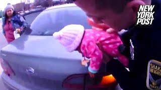 Officers save the life of a choking baby | New York Post