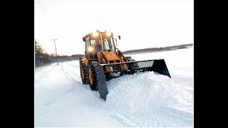 Чистка снега экскаватором