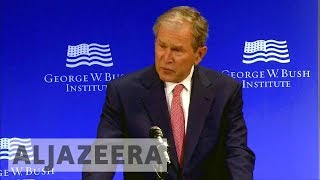 Obama and Bush deliver implicit rebukes to Trump