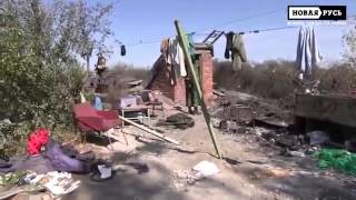 Луганск Аэропорт Идет сбор трупов в противогазах Погрузка на машину   Донецк Мариуполь