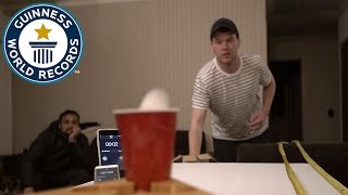 Most ping pong balls into a pint glass in one minute - Guinness World Records