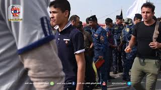 جانب من مسير  احمد الاسدي برفقة الشيخ سامي المسعودي مع الزائرين طريق بغداد كربلاء