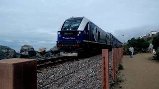 Morning hike in San Clemente Beach Trail while an Amtrak train passes by